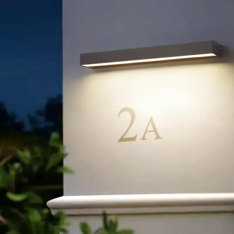 Applique murale extérieure LED Luminaire Essenza rectangulaire, blanc chaud 3000K, décoratif, 50 cm de long.