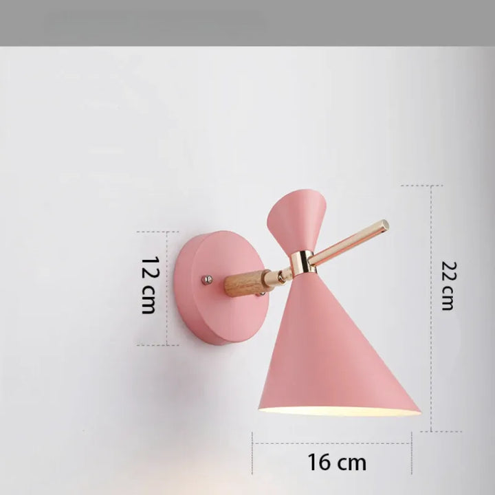Applique murale pour chambre adulte Luminaire Essenza, design nordique avec finition rose, éclairage doux et moderne.