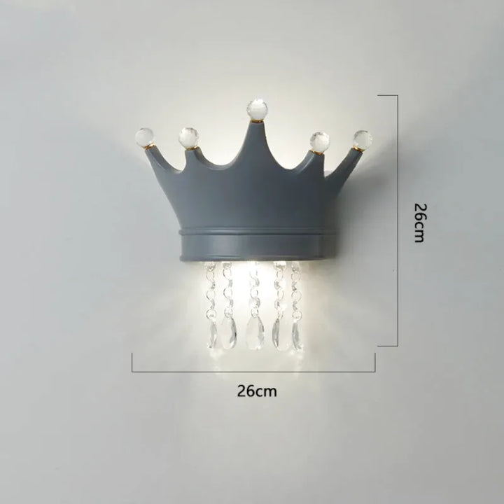 Applique murale pour chambre d'enfant Luminaire Essenza avec motif couronne en gris, disponible en trois couleurs, design doux.