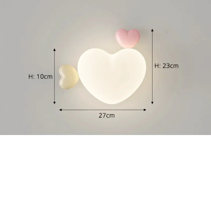 Applique murale pour chambre d'enfant fille Luminaire Essenza avec motif cœur, en trois couleurs, éclairage doux et décoratif.