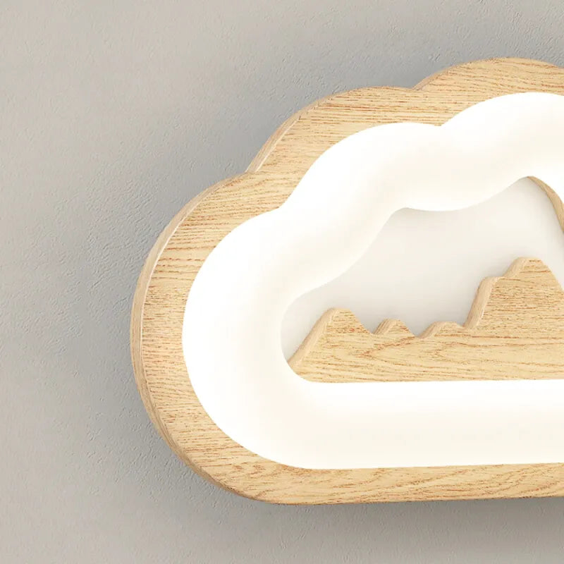 Applique murale pour chambre d'enfant en forme de nuage de la marque Luminaire Essenza, lumière douce et décorative.
