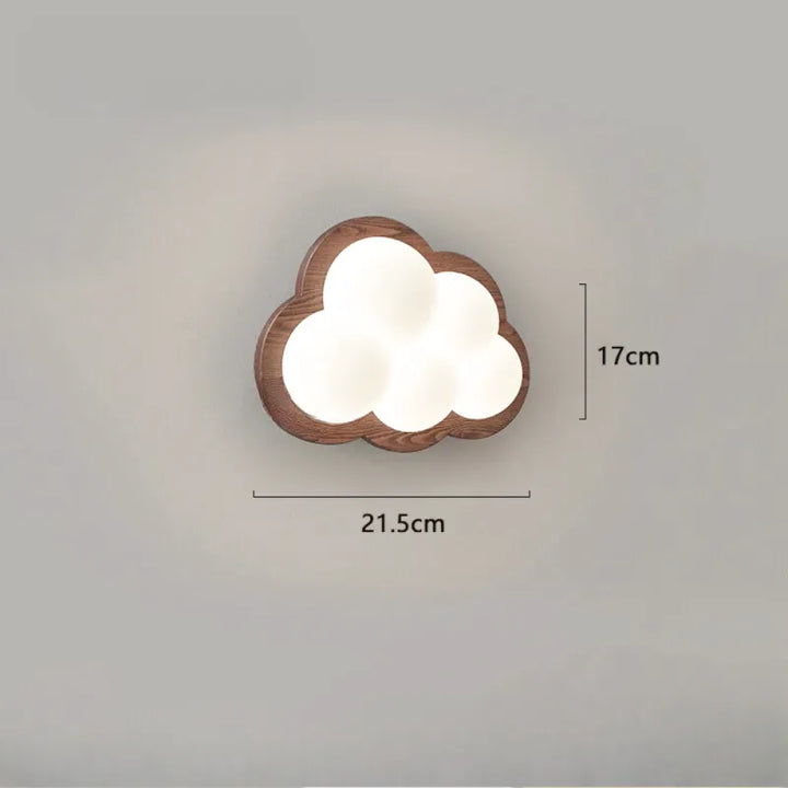 Applique murale enfant Nuage de Luminaire Essenza en bois de noyer, avec télécommande, pour chambre d'enfant.