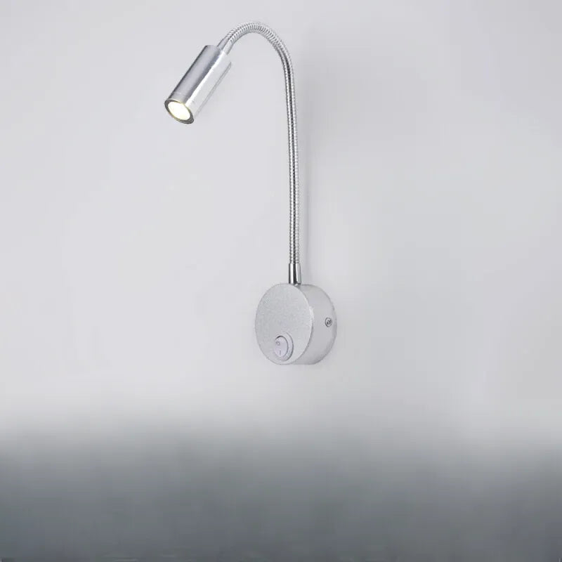 Applique murale chambre Liseuse Luminaire Essenza avec interrupteur, design chrome, lumière blanche chaude 3000K.