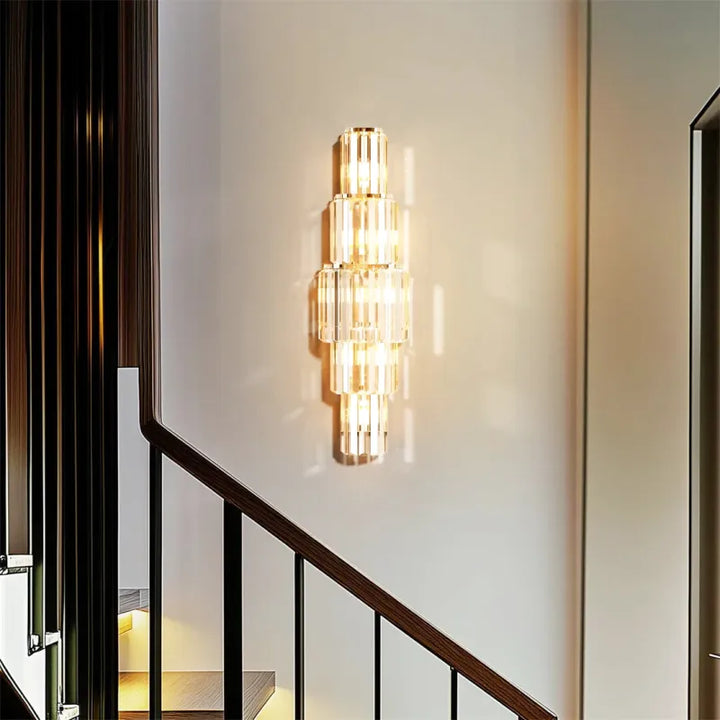 Applique murale en cristal nordique Luminaire Essenza, éclairage décoratif doré à 5 niveaux pour ambiance luxe et élégante.