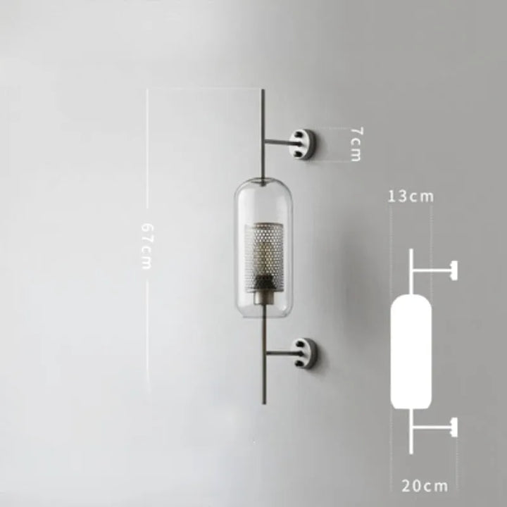 Applique murale design moderne en verre de la marque Luminaire Essenza, avec abat-jour élégant et fini en verre transparent.