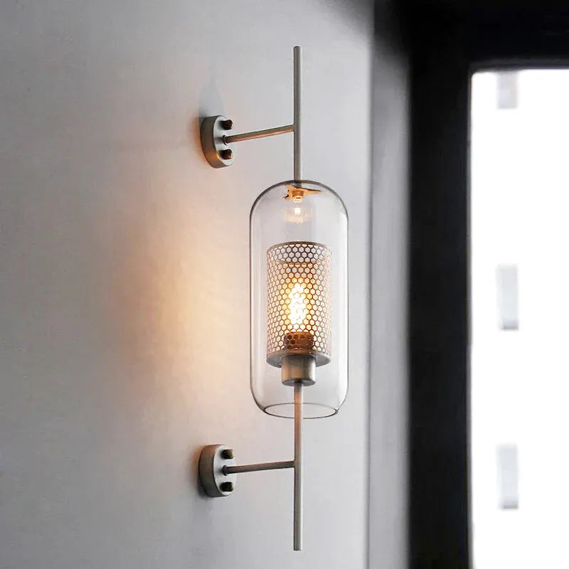 Applique murale design moderne en verre avec finition chrome, Luminaire Essenza, éclairage élégant pour intérieur contemporain.