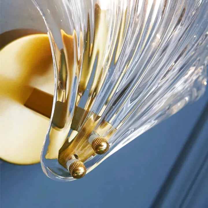 Applique murale en laiton avec cache en verre transparent, décoration élégante pour intérieur Luminaire Essenza.