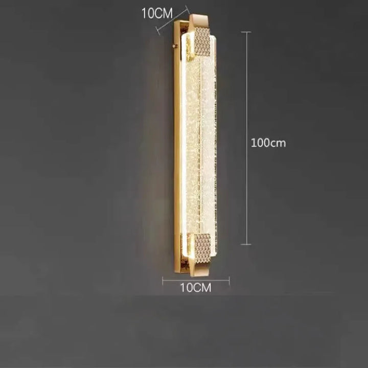 Applique murale LED de luxe Luminaire Essenza en cristal doré, moderne, 100 cm, avec options de lumière blanc chaud, naturel ou froid.