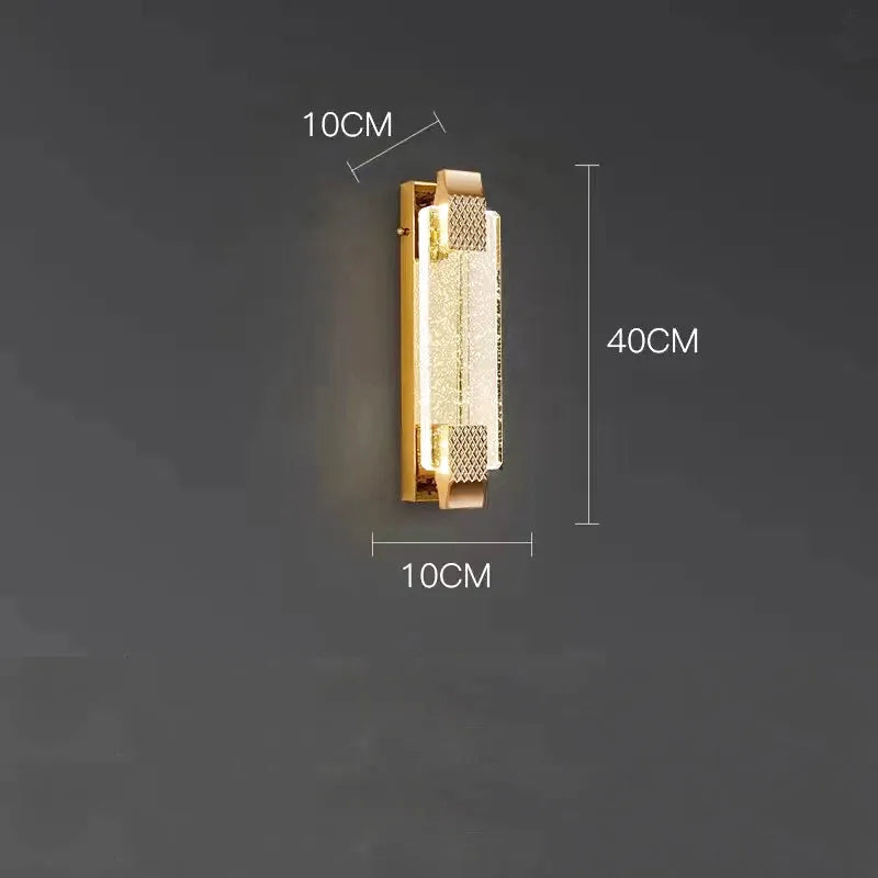 Applique murale LED de luxe Luminaire Essenza en cristal doré, avec éclat moderne, 40 cm, disponible en blanc chaud, naturel ou froid.