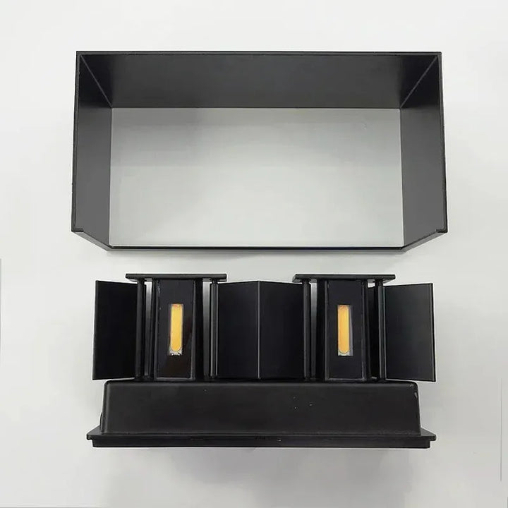 Applique murale LED noire de style nordique minimaliste, rectangulaire, 20 cm, lumière blanc chaud 2700-3500K, moderne et élégante.
