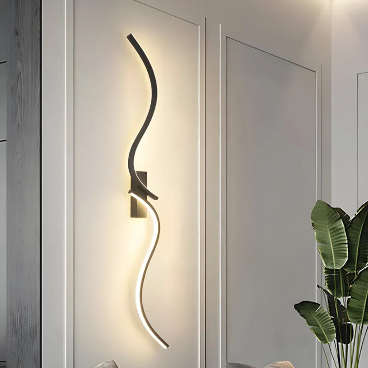 Applique murale LED Luminaire Essenza élégante, moderne, minimaliste et décorative pour l’éclairage intérieur.