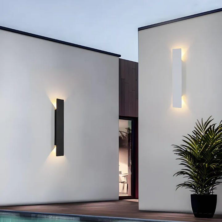 Applique murale LED extérieure minimaliste et moderne Luminaire Essenza, noir ou blanc, éclairage chaud, 20 cm de diamètre.