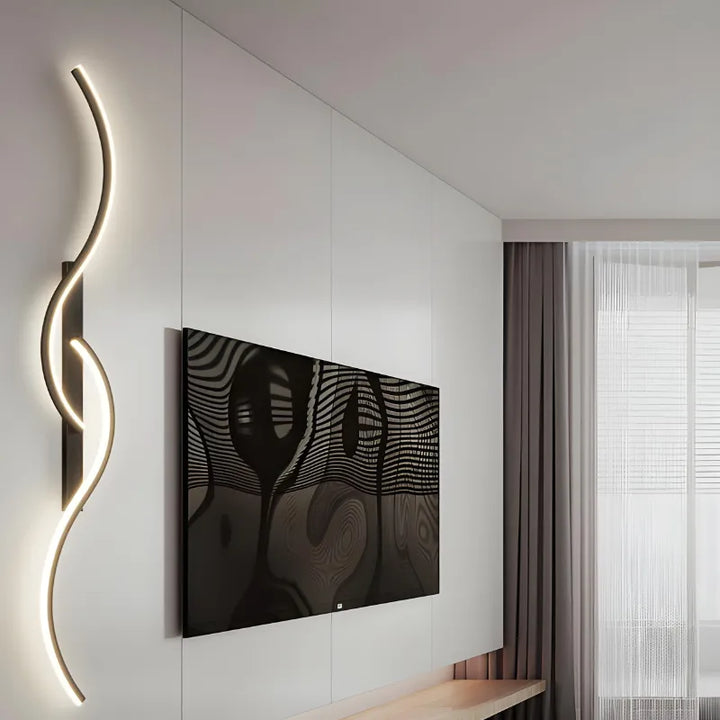 Applique murale LED longue, élégante et moderne, décorative, par Luminaire Essenza, fixation murale fine et design élégant.