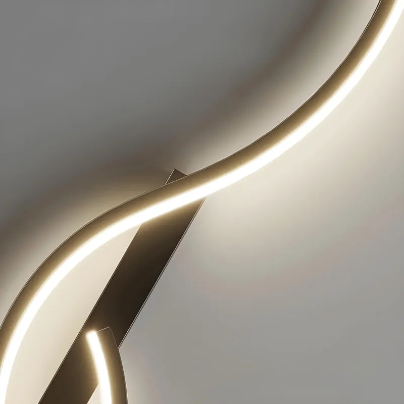 Applique murale LED longue, élégante et moderne, avec design décoratif, par Luminaire Essenza, éclairage sophistiqué pour mur intérieur.