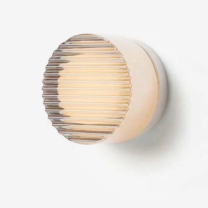 Applique murale LED moderne Luminaire Essenza, design cylindrique décoratif pour éclairage intérieur élégant et contemporain.