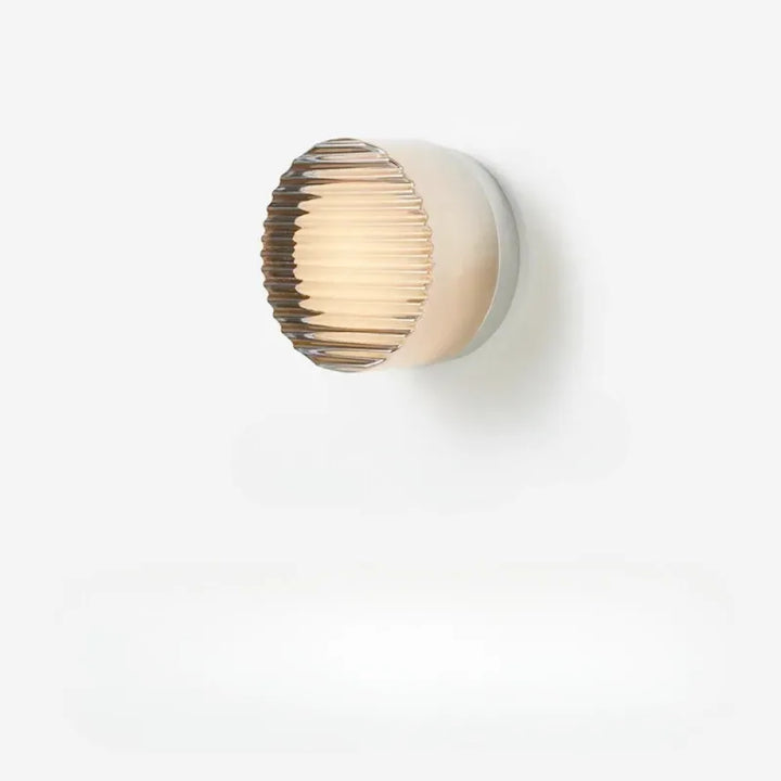 Applique murale LED moderne Luminaire Essenza, design cylindrique gris et blanc chaud, éclairage décoratif pour intérieur.