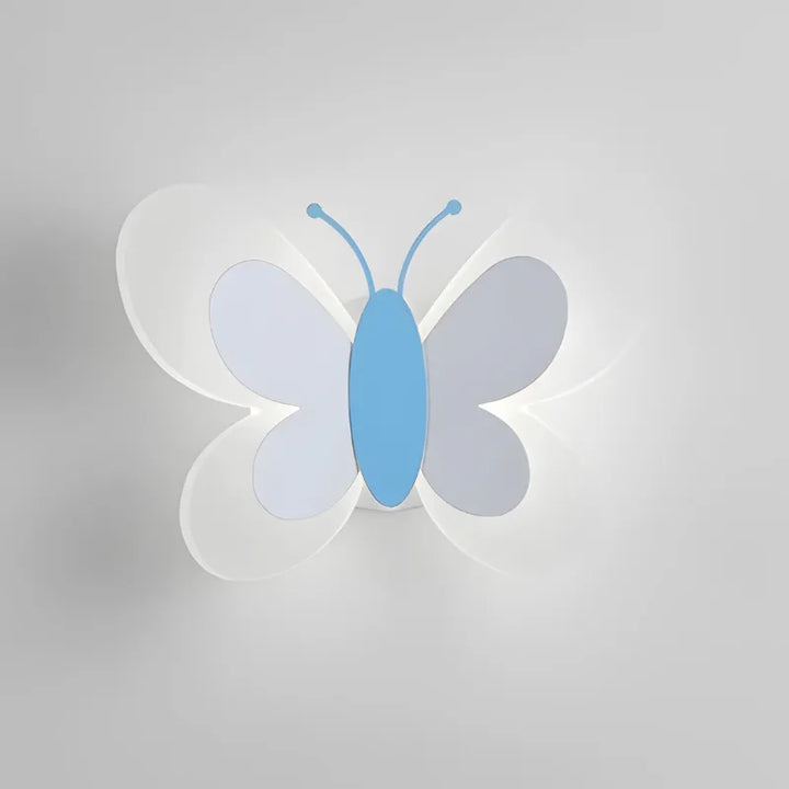 Applique murale LED moderne en forme de papillon blanc froid, design élégant pour décoration intérieure.