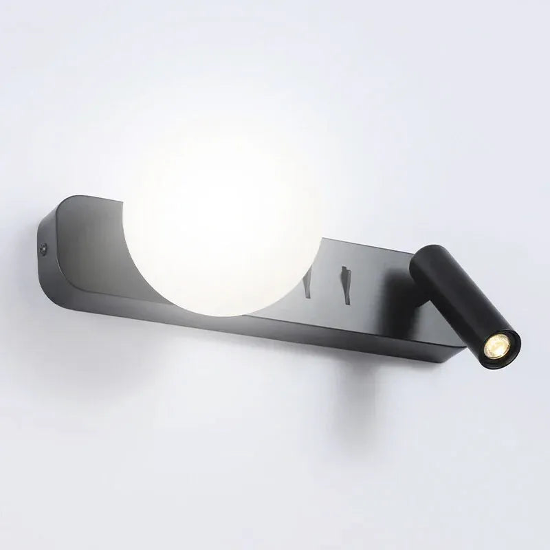 Applique murale LED rotative moderne Luminaire Essenza, noir et blanc, lumière chaude, design élégant pour intérieur.