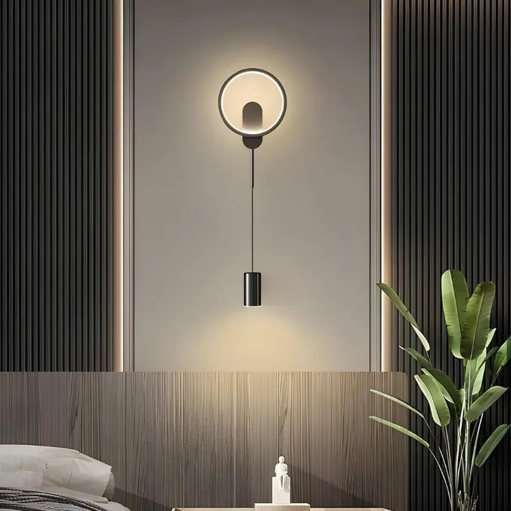 Applique murale salon LED moderne et nordique de Luminaire Essenza, design noir et blanc avec lumière chaude.